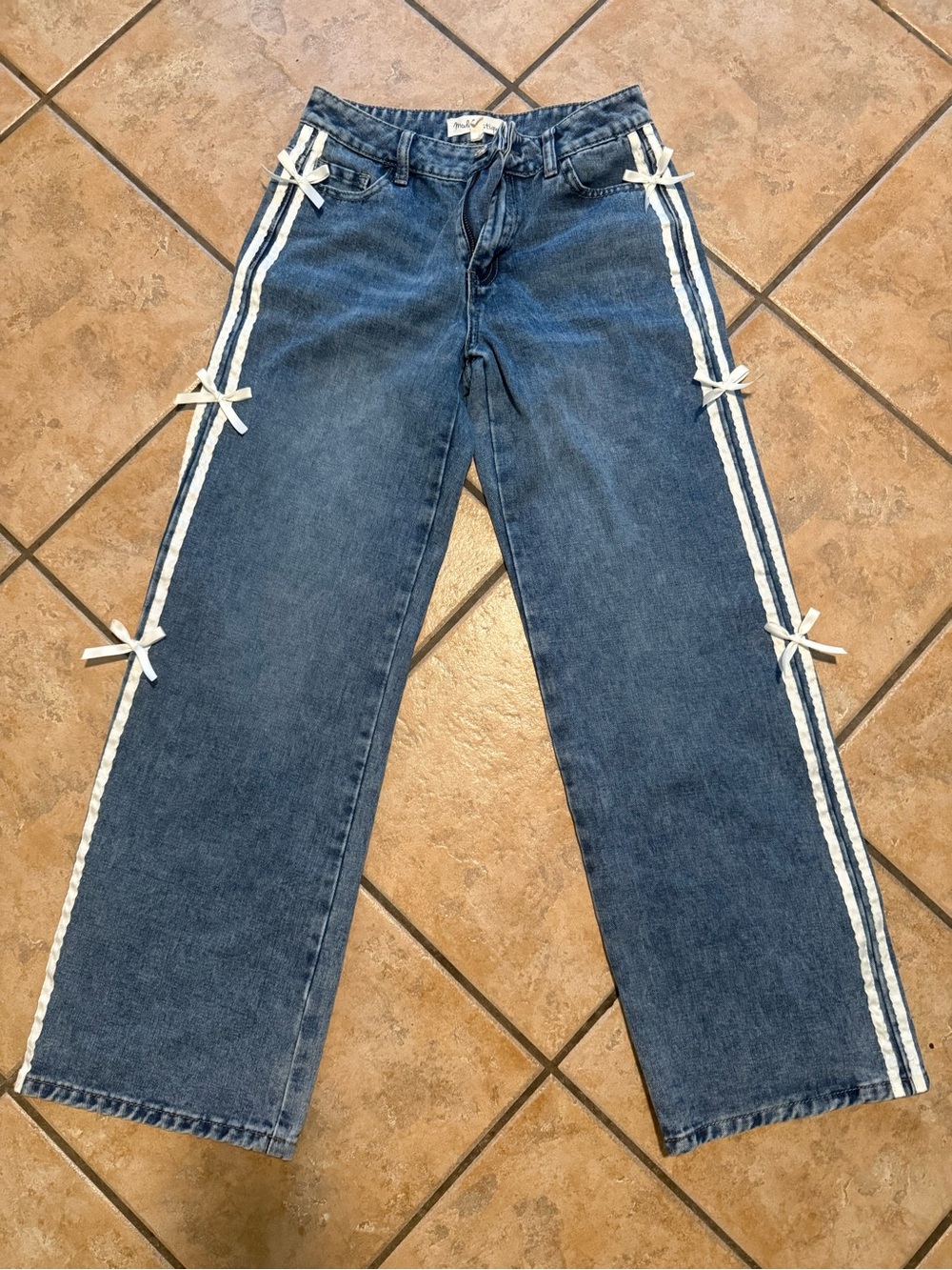 Women’s Blue Denim Jeans with White Side Stripes and Bows